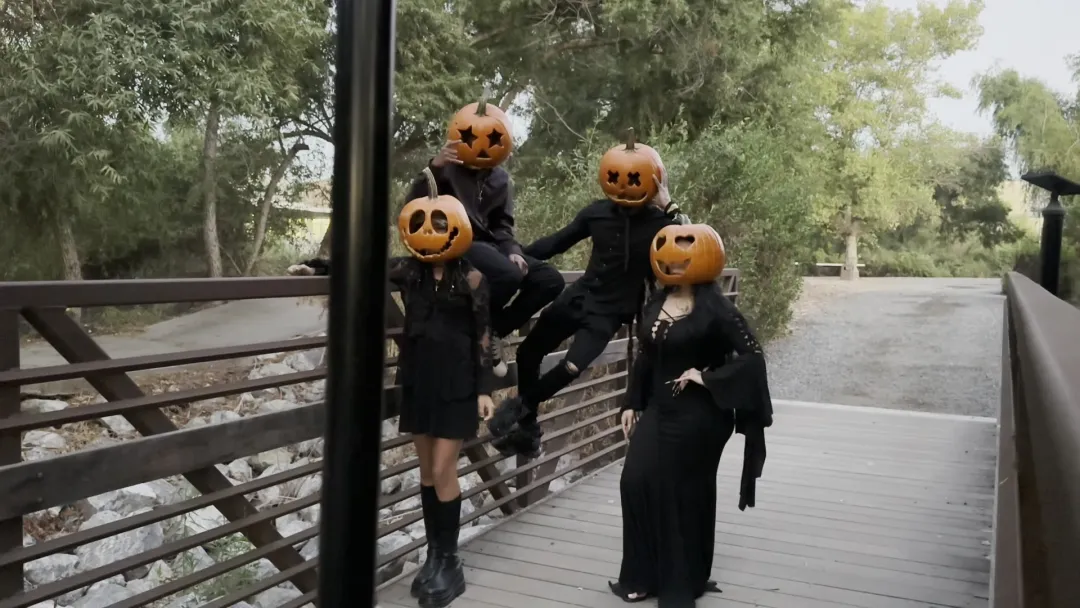 Group of four friends on the left and the result with four carved glowing pumpkin heads on the right.